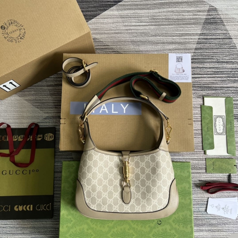 G*u*i top handle bags